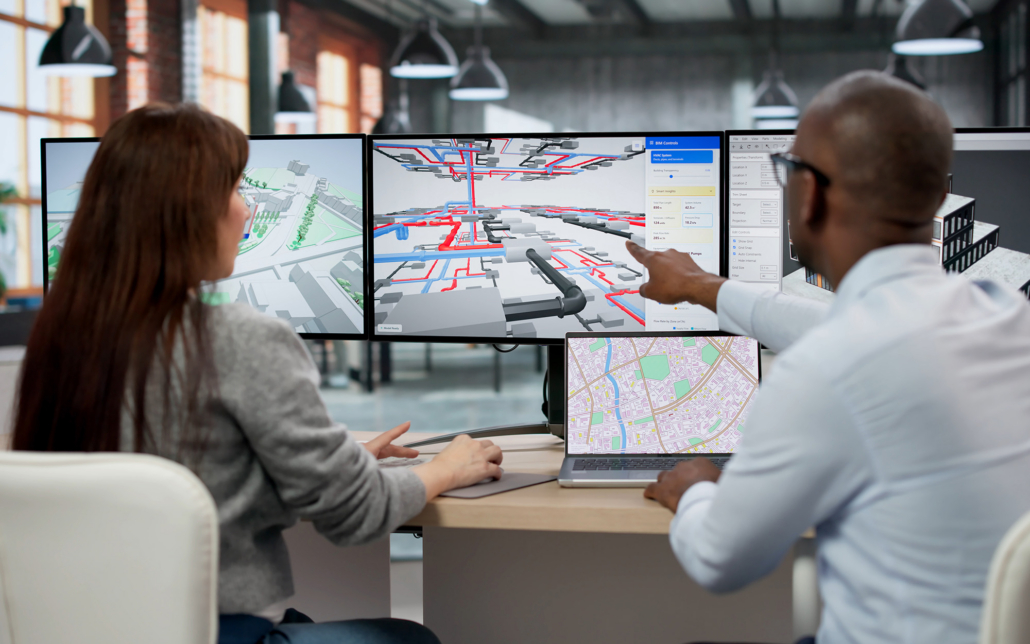 Hvac Professionals Looking Over Ductwork Plans