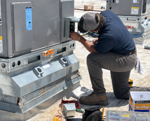 Man Working On Hvac Unit