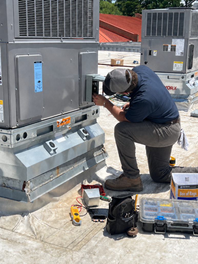 Man Working On Hvac Unit
