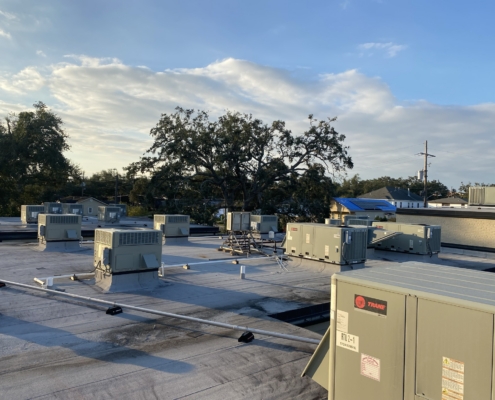 Wide View Of Roof With A Lot Of Hvac Units