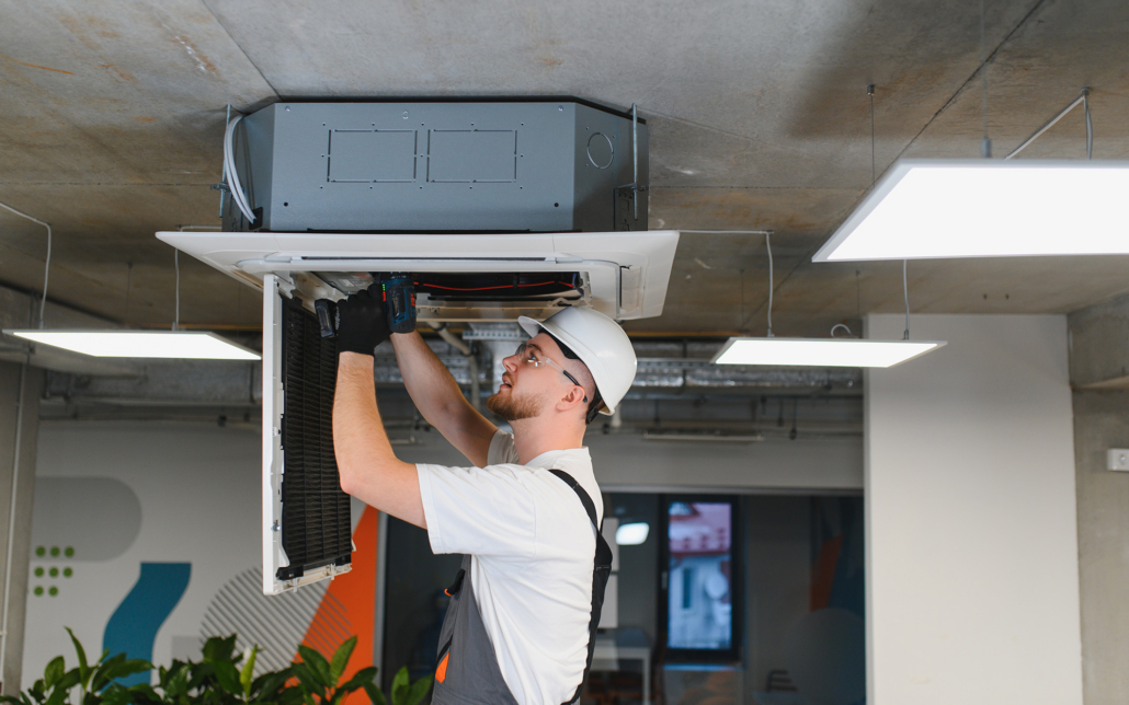 Worker Installing Hvac Vent